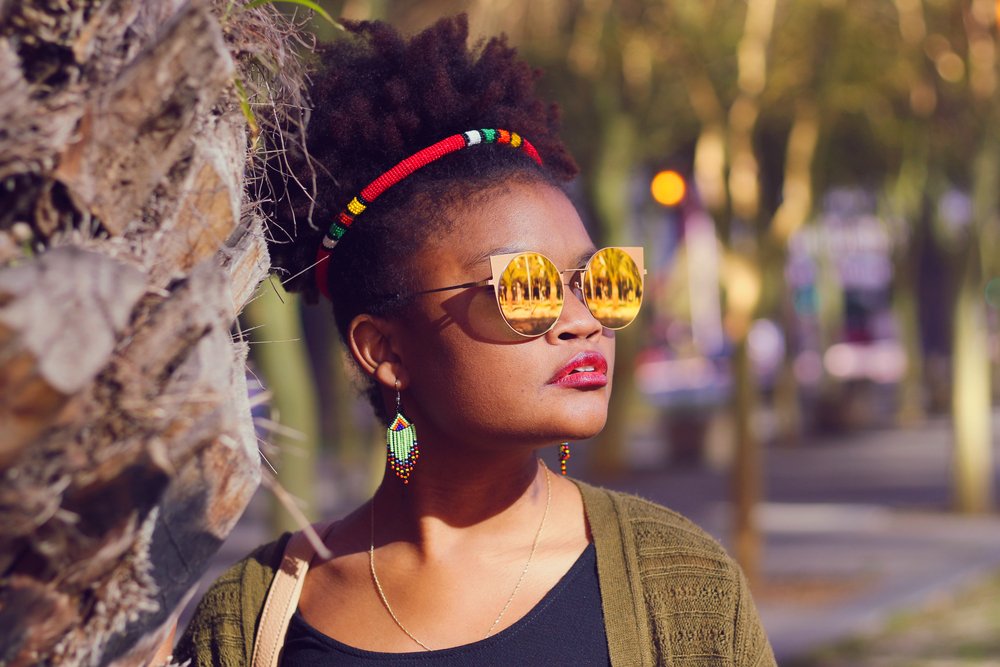 African Lady with Zulu Hairband on Her Afro Wearing Sunglasses